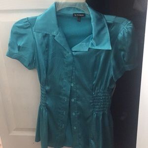 Nearly a Turquoise green colour satin blouse
